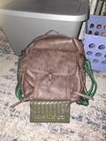 Brown and green faux leather backpack purse with green wallet