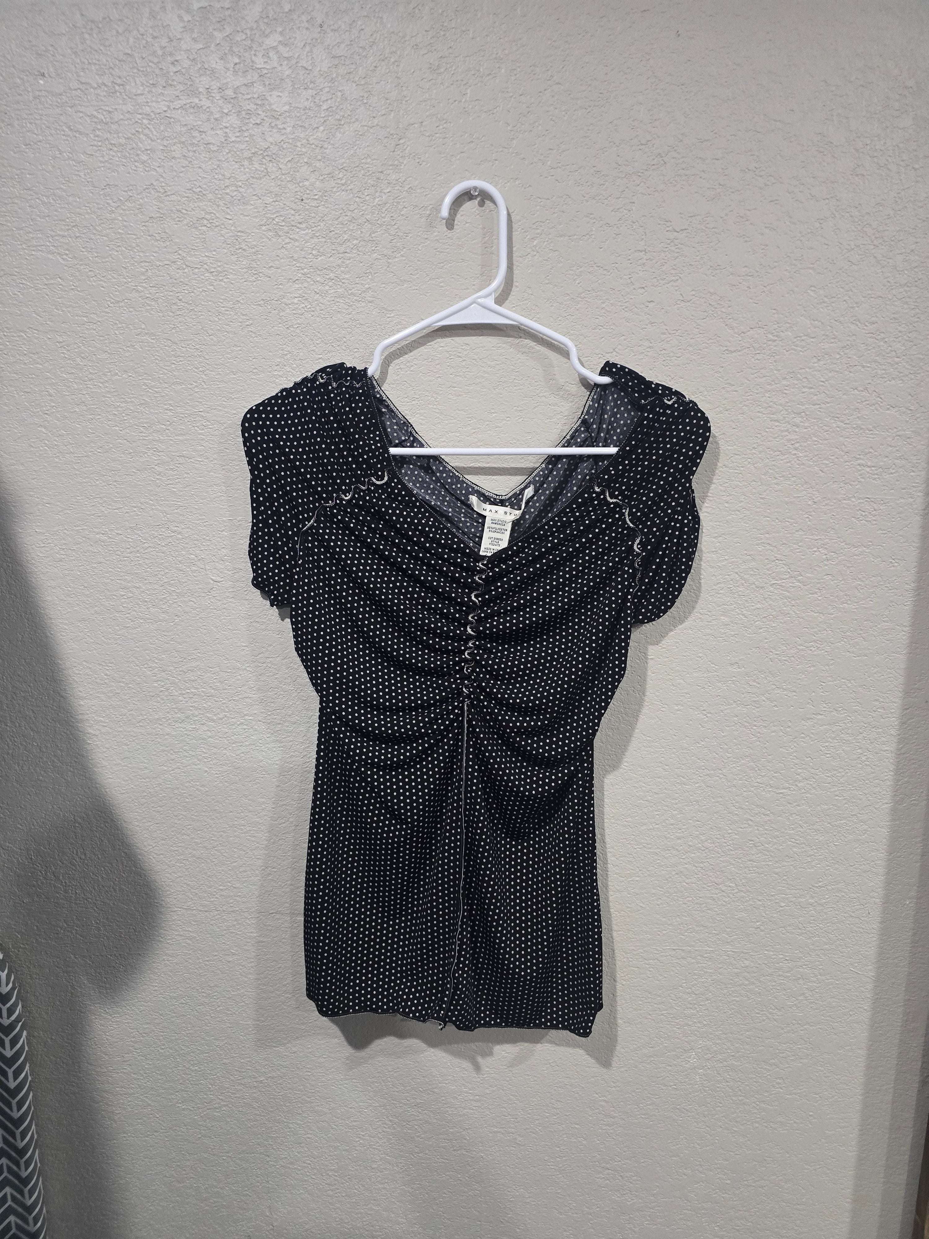 Black polka dot blouse